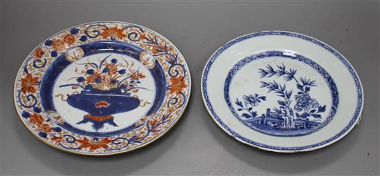 A Chinese Imari plate decorated with flowers in an urn, 25cm and a blue and white plate, 23cm